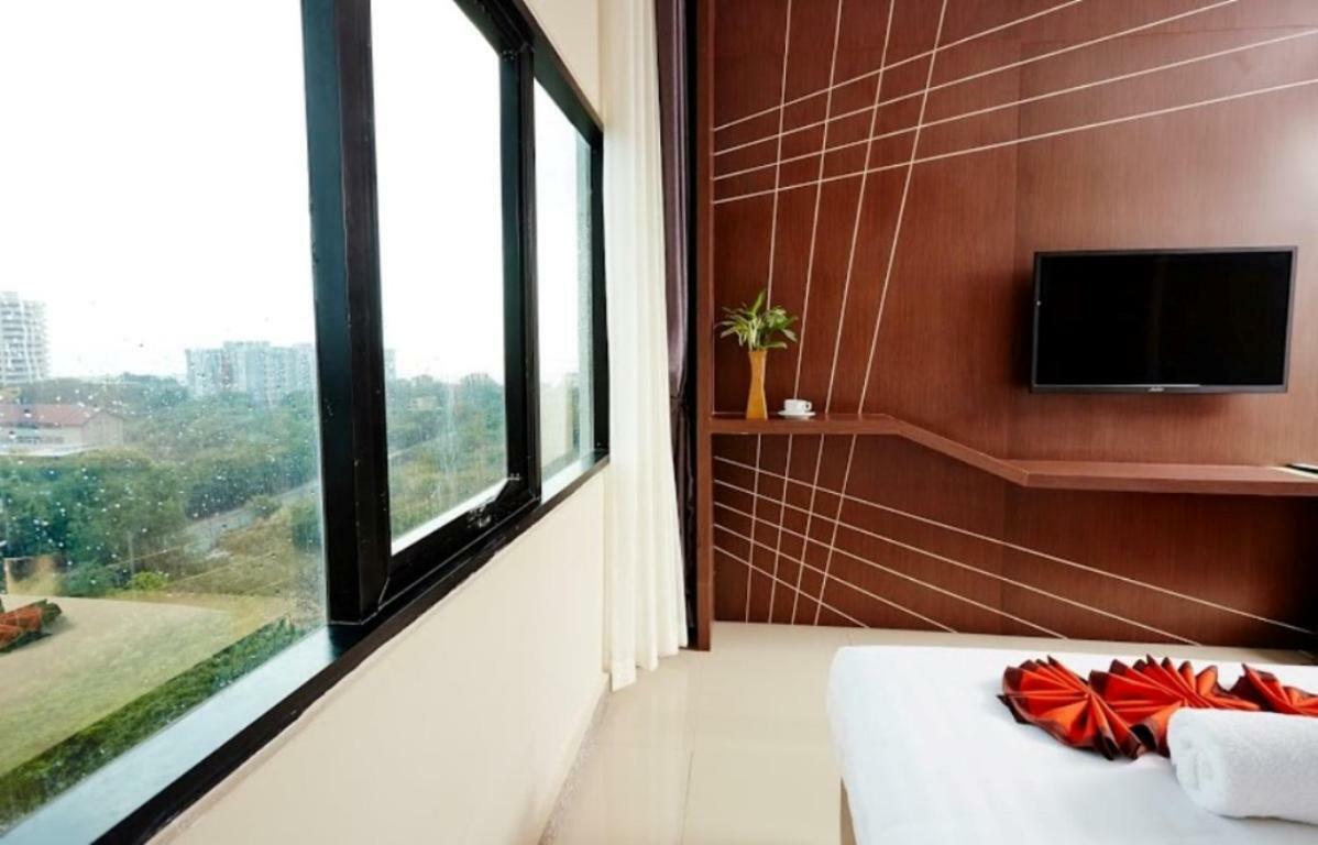 Ease Jomtien Hotel Buitenkant foto